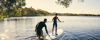 Far Og Søn På Padleboard